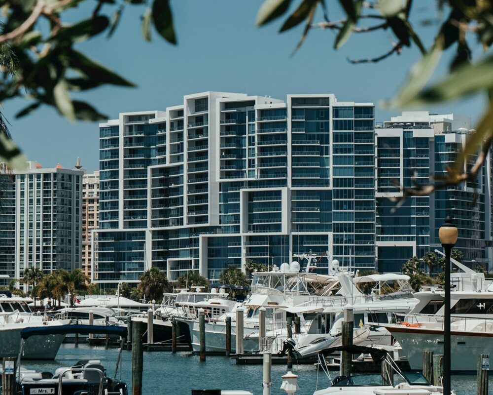 Sarasota bayfront marina with the downtown skyline at golden hour